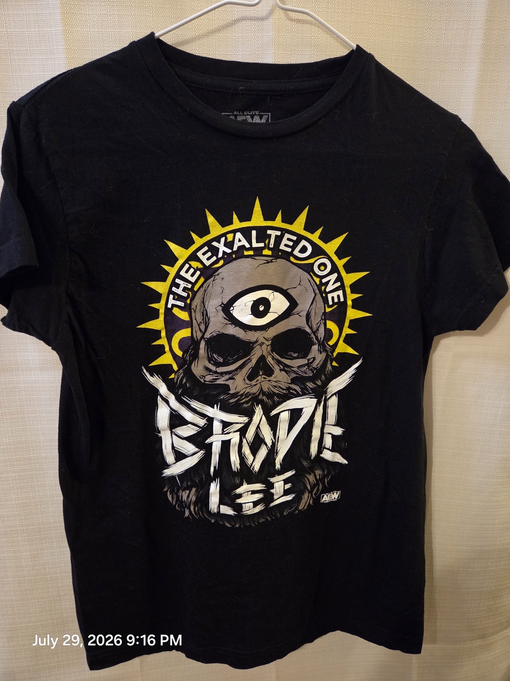 Black Graphic Tee with Yellow and White Skull Motif